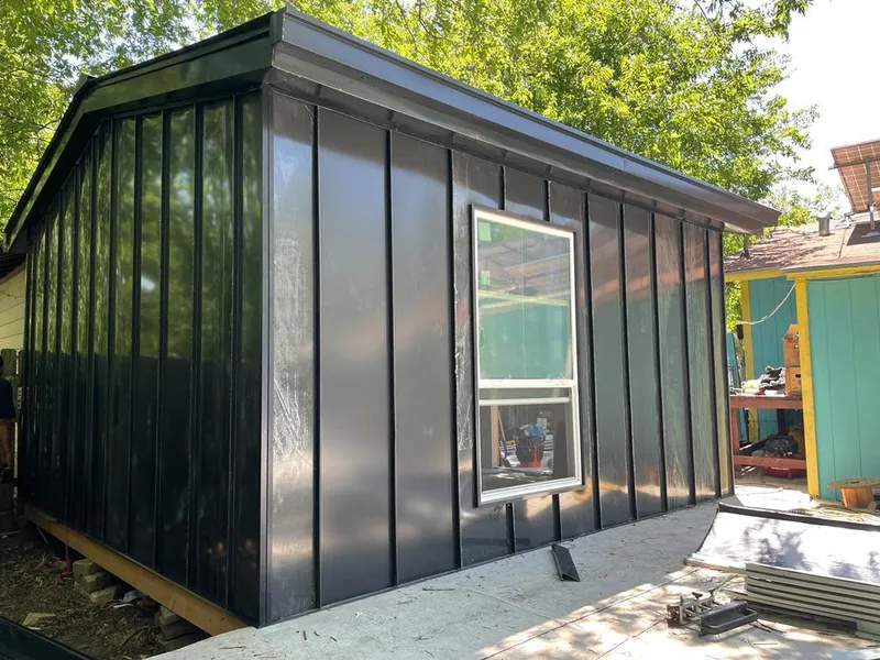 Black standing seam metal wall panels for Metal Roof Installation in Clark