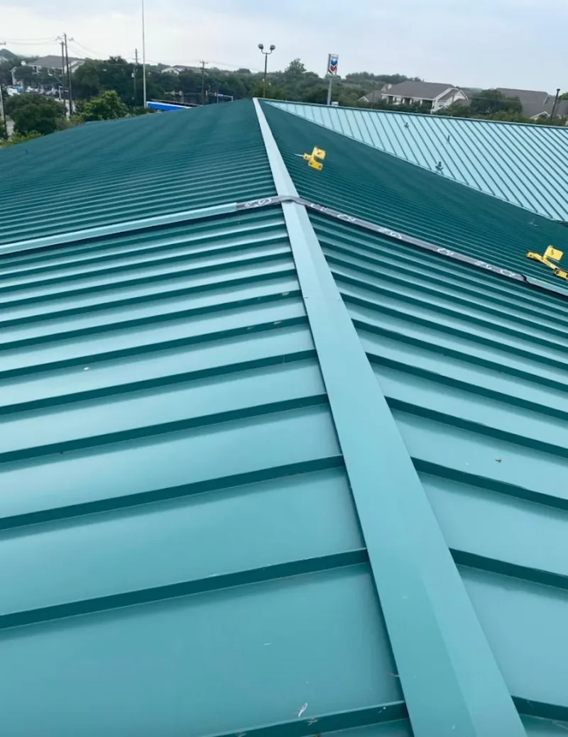 Green commercial metal roof ridge and valley for Metal Roof Repair in Clark