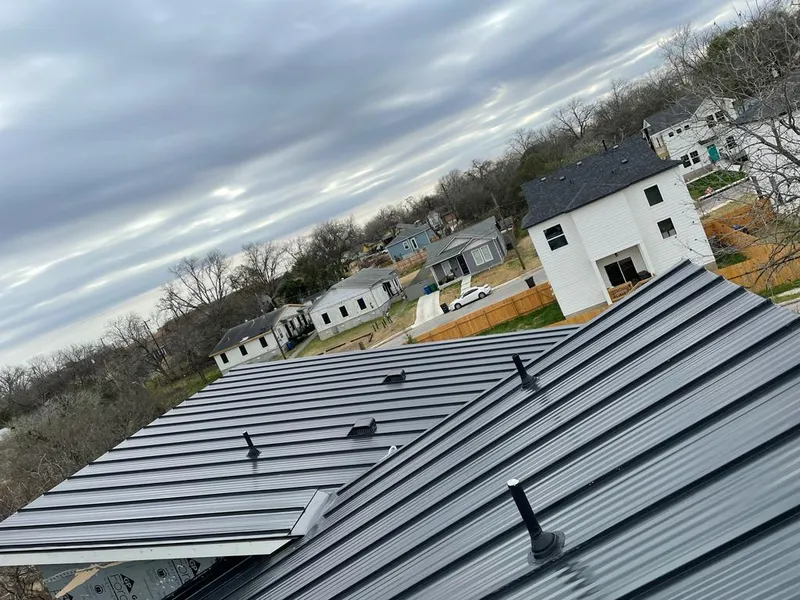 Standing seam metal roof panels with vents for Skylight Repair in Clark